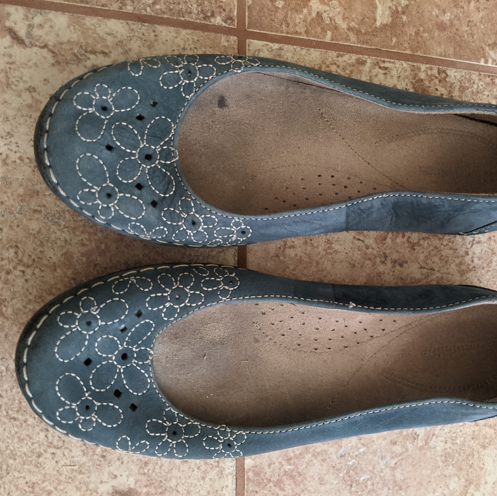 Blue leather flats with floral embroidery
